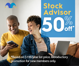 A man and woman smiling while using a mobile phone and laptop, promoting a 50% discount on a Stock Advisor subscription.